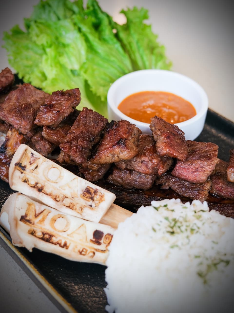 Grilled Korean-style beef with rice and house sauce